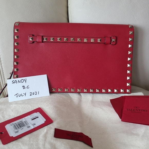 Valentino Garavani Handbags - Valentino red rockstud clutch